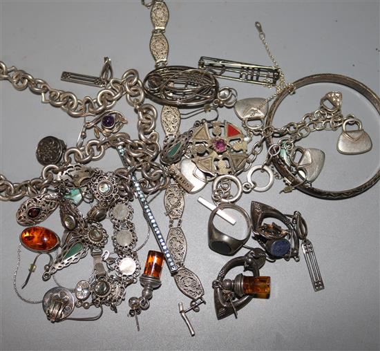 A quantity of silver jewellery including necklaces, earrings and brooches.